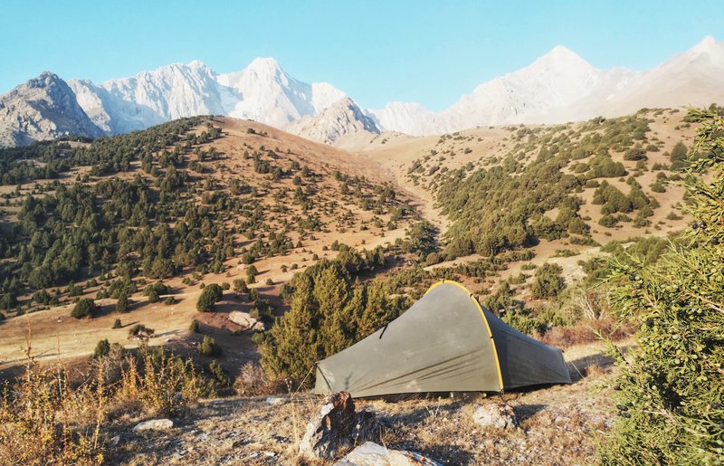 A photograph of a tent pitch in the Revut Valley, Tajikistan.